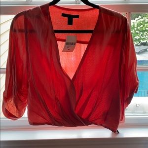 Never worn free people deep V top